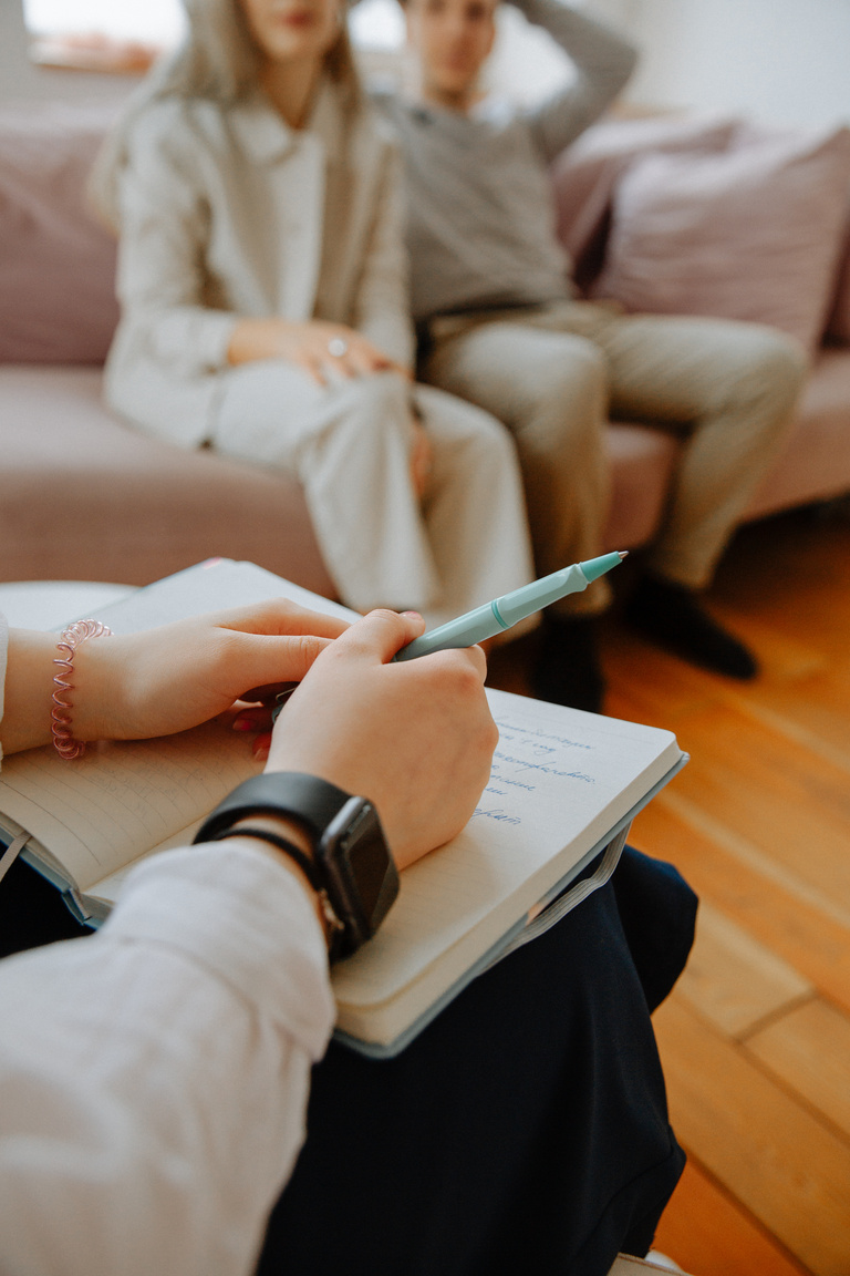 Therapist Holding Notebook